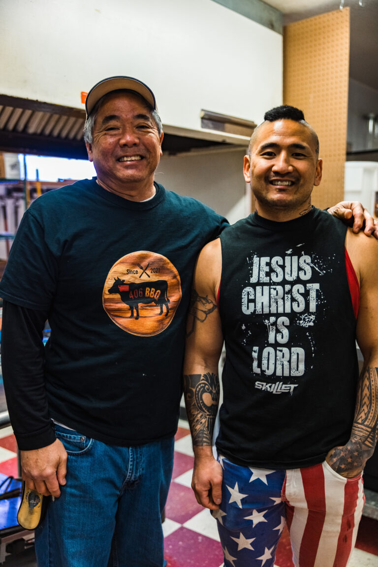 Photo of Stephen and father Jason Kina smiling